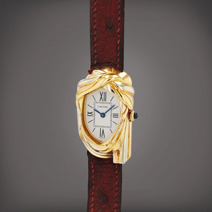 Cartier watch with red strap